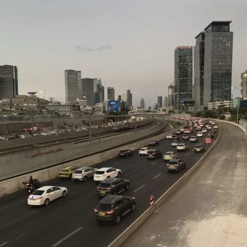 Tel Aviv cityscape illustrating air-quality health advice
